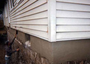 parging coat for basement wall repair