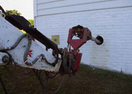 Tie Back Skid Loader