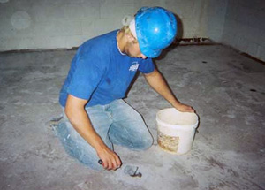 mud jacking professional with blue shirt